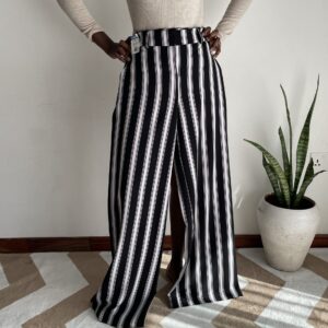 Black and white striped palazzo pants. It has a tailored zipper & pockets too. Its length is tall, girl-friendly