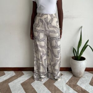 New Arrivals cream and black abstract line wide-leg pants front view