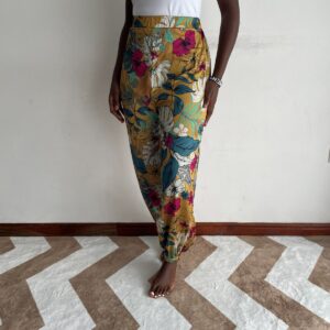 New Arrivals mustard tropical floral tapered trousers front view