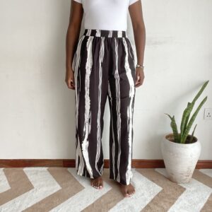 Black and cream irregular brushstroke stripe wide-leg pants, front view