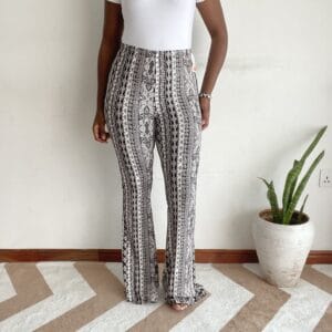 Black and white ornate boho stripe flare pants, front view