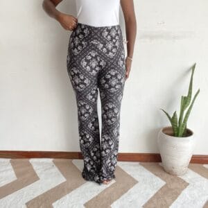 Charcoal background white damask floral trellis wide-leg pants, front view