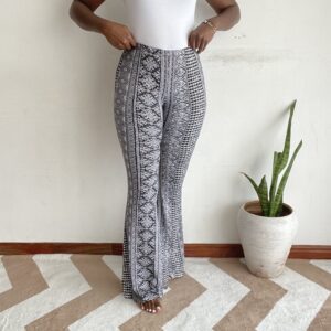 Gray and black tribal print flare pants, front view
