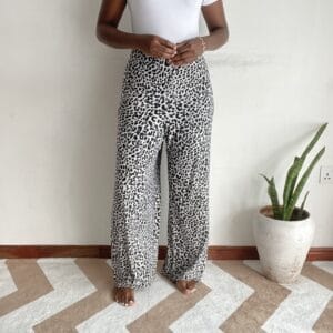 Black and white leopard print plus-size straight-leg pants, front view