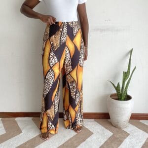 Orange black leopard and paisley patchwork plus-size wide-leg pants, front view