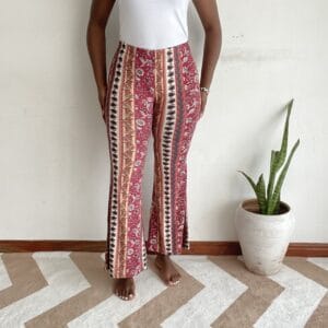 Red and cream boho floral border-stripe flare pants, front view