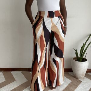 Rust tan black and cream abstract colour-block wide-leg pants, front view